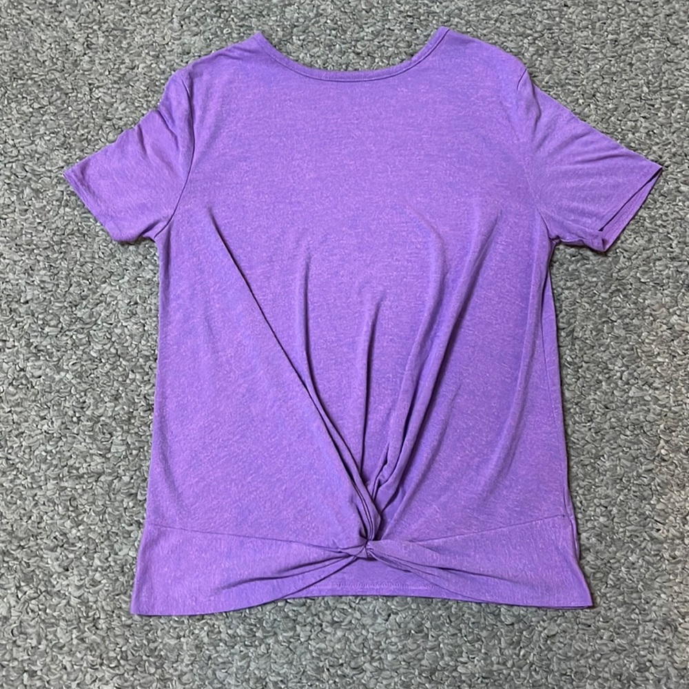 Purple athletic shirt with front twist